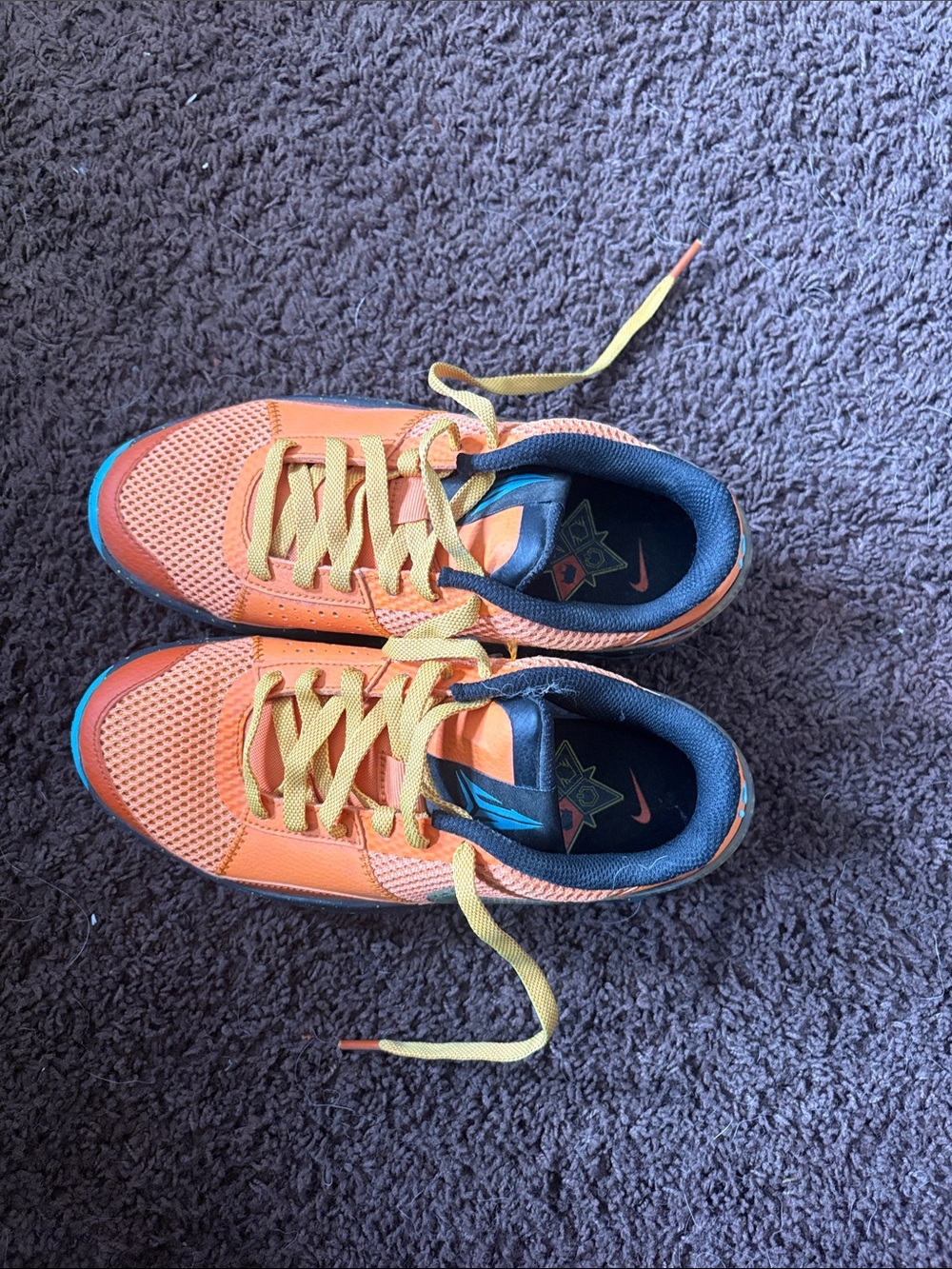 Nike Kids Orange and Yellow Sneakers with Blue Accents - Picture 2 of 3